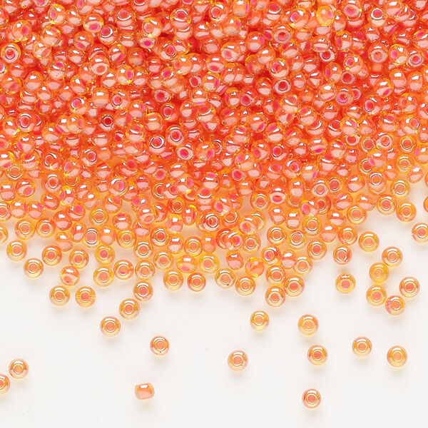 Seed bead, Preciosa Ornela, glass, translucent pink-lined luster yellow amber, #11 rocaille. Sold per 50-gram pkg. image number 0