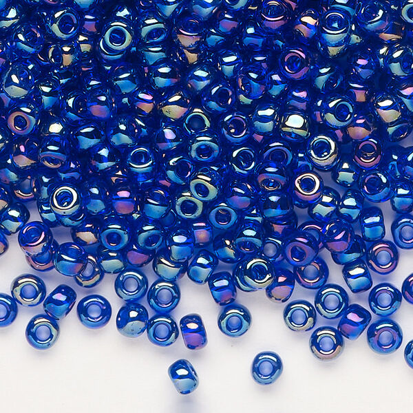 Seed bead, Dyna-Mites™, glass, transparent rainbow iris blue, #6 round. Sold per 1/2 kilogram pkg. image number 0