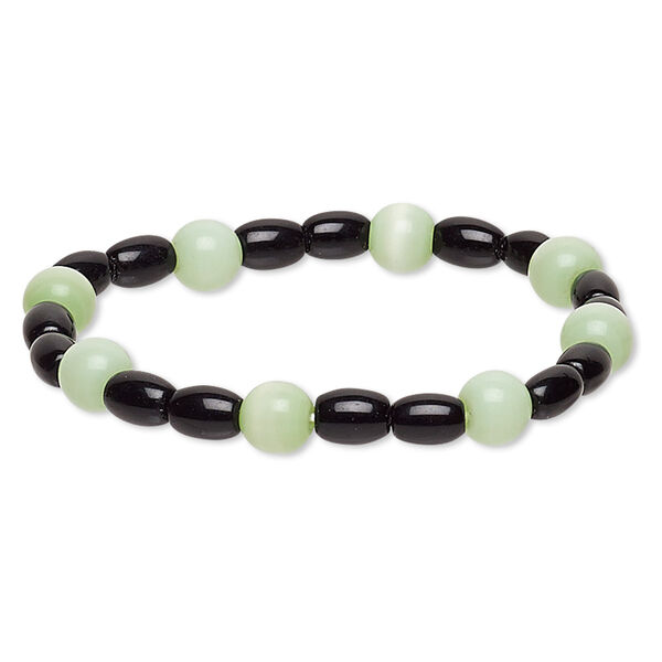 Bracelet, stretch, glass and cat's eye glass, opaque sea green and black, 7-8mm round and 7x5mm-8x6mm barrel, 6-1/2 inches. Sold individually. image number 0