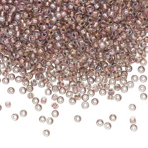 Seed bead, TOHO BEADS®, glass, pkg/50g, #11 round, translucent rose gold-lined crystal clear (TR-11-267).