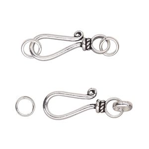 Clasp, hook-and-eye, antiqued sterling silver, 16x8mm-18x9mm with lines design and (2) soldered half-round jump rings. Sold per pkg of 2.