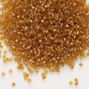 Seed bead, Delica®, glass, pkg/7.5g, #11 round, translucent topaz-lined luster topaz (DB-0065).