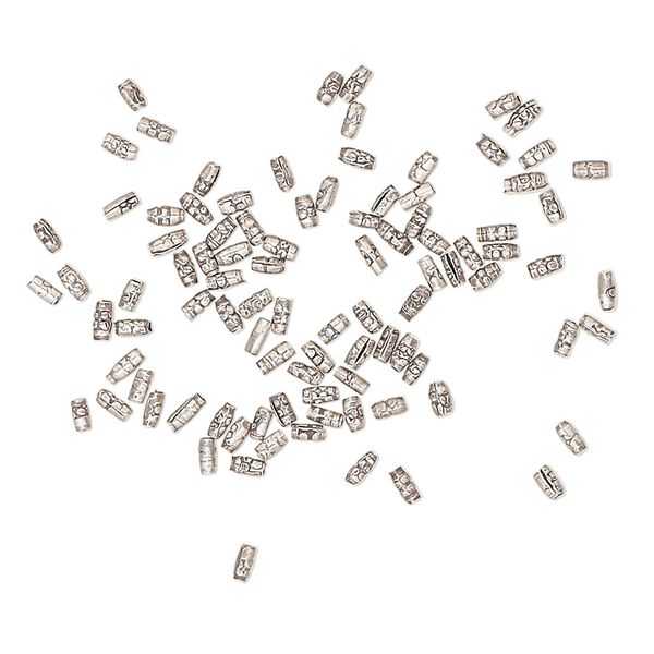 Bead, antiqued fine silver, 2x1mm textured oval. Sold per 1-gram pkg, approximately 95 beads. image number 0