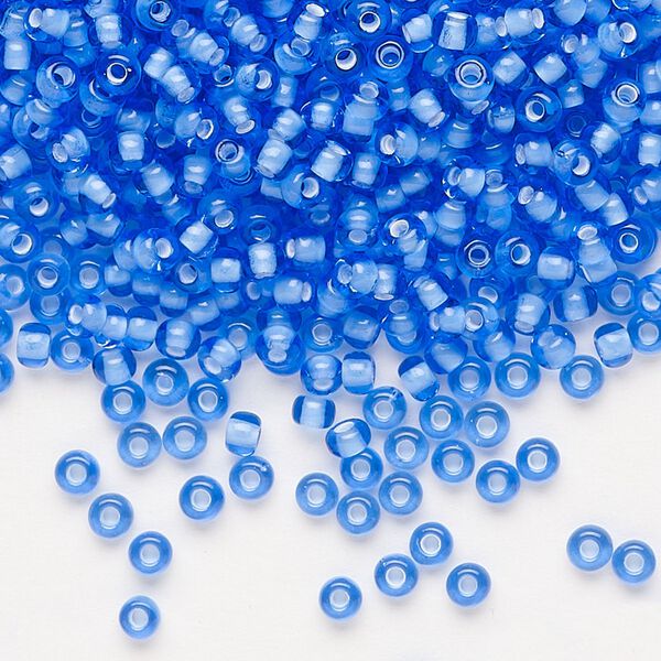 Seed bead, Preciosa Ornela, glass, transparent chalkwhite-lined light sapphire, #8 rocaille. Sold per 50-gram pkg. image number 0