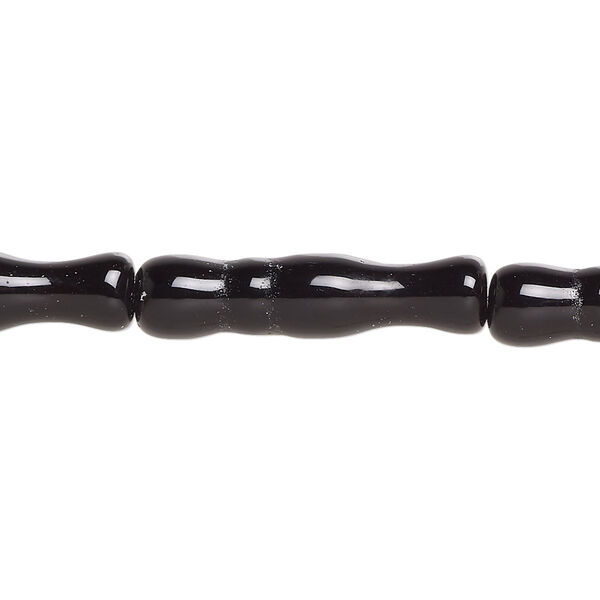 Bead, glass, opaque black, 25x6mm-26x7mm textured round tube. Sold per 15-inch strand. image number 0
