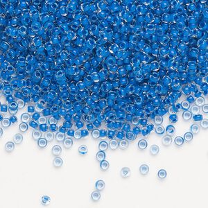 Seed bead, Preciosa Ornela Czech glass, pkg/50g, #11 rocaille, transparent terra intensive blue-lined clear, (08A38).