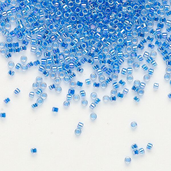 Seed bead, Delica®, glass, pkg/7.5g, #11 round, translucent blue-lined rainbow crystal clear (DB-0077). image number 0