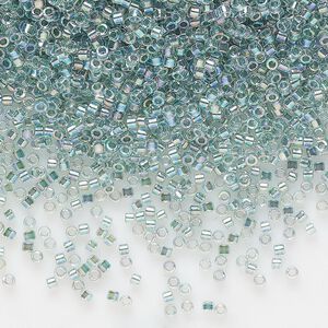Seed bead, Delica®, glass, pkg/7.5g, #11 round, translucent seafoam-lined rainbow crystal clear (DB-0084).