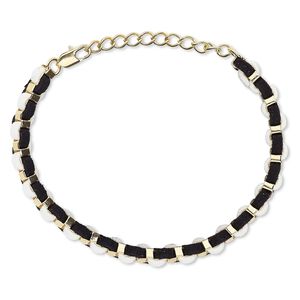 Brracelet, imitation leather with gold-finished brass and steel, black and white, 6mm wide, 6-1/2 inches with 2-inch extender chain and lobster claw clasp. Sold individually.