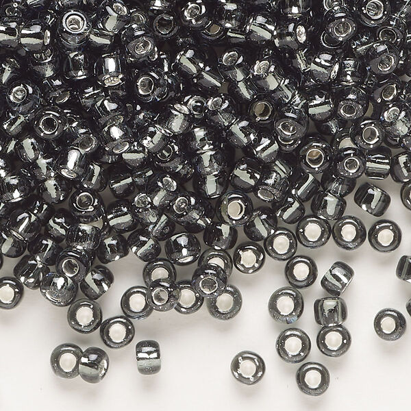 Seed bead, Dyna-Mites™, glass, transparent silver-lined gunmetal, #6 round. Sold per 40-gram pkg. image number 0