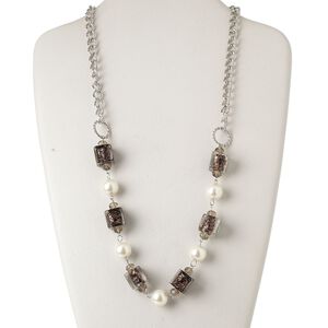 Necklace, lampworked glass / glass pearl / silver-finished steel / acrylic, white / clear / black with copper-colored glitter, 15x15mm square and 14mm round, 28-inch continuous loop. Sold individually.