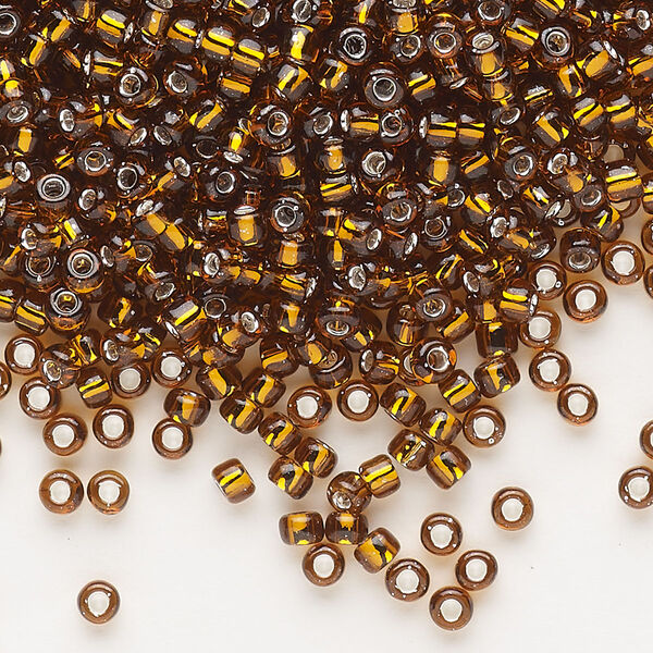 Seed bead, Dyna-Mites™, glass, silver-lined translucent root beer, #8 round. Sold per 1/2 kilogram pkg. image number 0