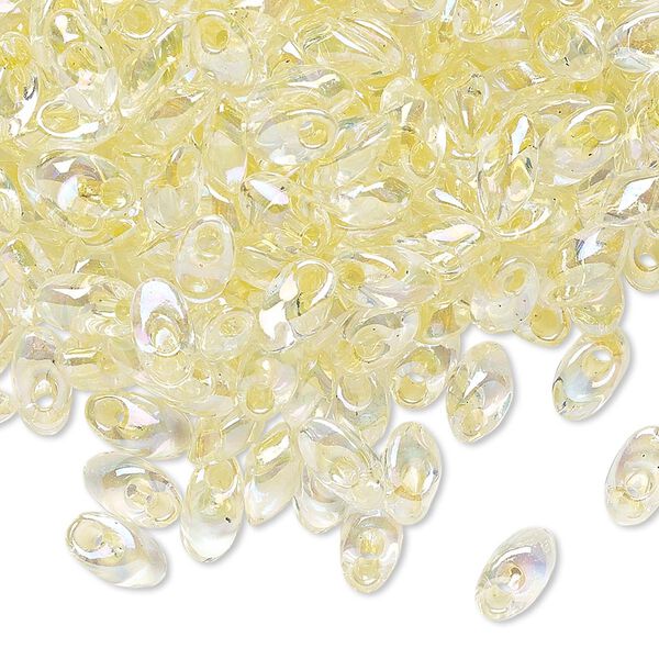 Seed bead, Miyuki, glass, pkg/250g, 7x4mm long magatama, translucent pale yellow inside dyed color crystal clear, (LMA-2146). image number 0