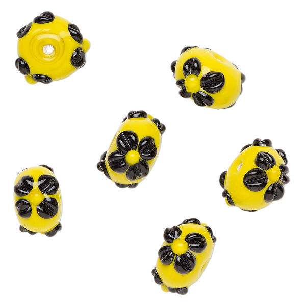 Bead, lampworked glass 1pkg6, opaque yellow / black, 18x11mm rondelle with flowers. image number 0