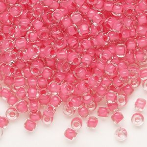 Seed bead, Dyna-Mites™, glass, translucent inside color pink, #6 round. Sold per 40-gram pkg.
