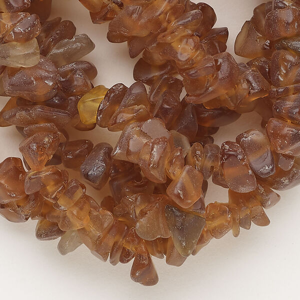 Bead, glass 1pkg1, translucent frosted brown, small to extra-large chip, 30-inch strand. image number 0
