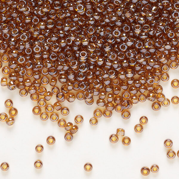 Seed bead, Preciosa Ornela Czech glass, pkg/500g, #10 rocaille, translucent luster topaz, (16090). image number 0