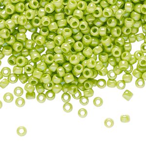 Seed bead, TOHO BEADS®, glass, pkg/250g, #8 round, opaque rainbow sour apple (TR-08-404).