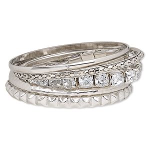 Bracelet, bangle and stretch, glass rhinestone and imitation rhodium-finished steel, clear, 2-8mm wide with cupchain and spike, 7-8 inches. Sold per 5-piece set.