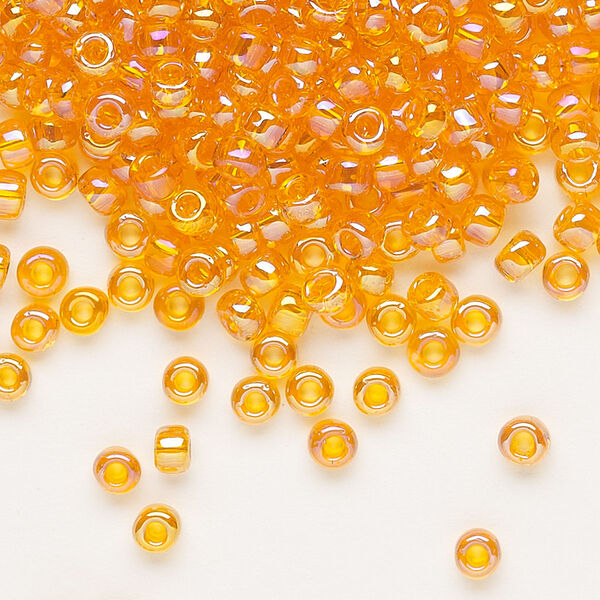 Seed bead, Dyna-Mites™, glass, transparent rainbow orange, #6 round. Sold per 1/2 kilogram pkg. image number 0