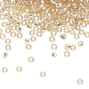 Seed bead, TOHO BEADS®, glass, pkg/250g, #8 round, transparent silver-lined rosaline (TR-08-31).