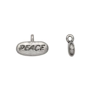 Charm, antiqued pewter (tin-based alloy), 15x7mm "PEACE" pebble. Sold per pkg of 4.