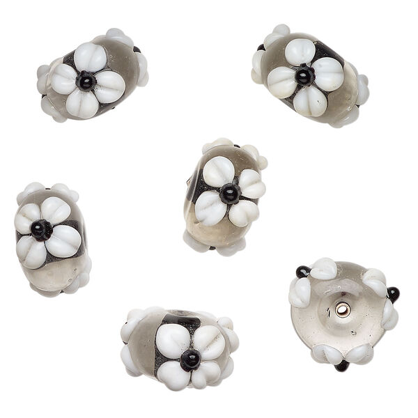 Bead, lampworked glass 1pkg6, clear / opaque white / black, 18x11mm rondelle with flowers. image number 0