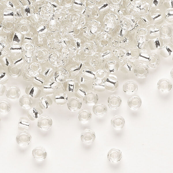 Seed bead, Dyna-Mites™, glass, transparent silver-lined clear, #6 round. Sold per 1/2 kilogram pkg. image number 0