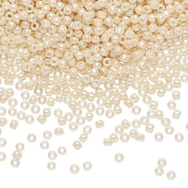 Seed bead, TOHO BEADS®, glass, pkg/250g, #11 round, opaque luster light beige (TR-11-123). image number 0