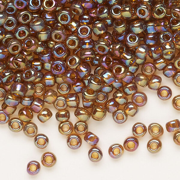 Seed bead, Dyna-Mites™, glass, transparent rainbow root beer, #6 round. Sold per 40-gram pkg. image number 0