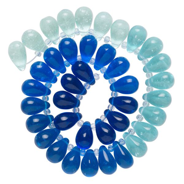 Bead, glass, transparent pale blue, blue and royal blue, 16x10mm top-drilled teardrop with irregular rondelles. Sold per 14-inch strand. image number 0