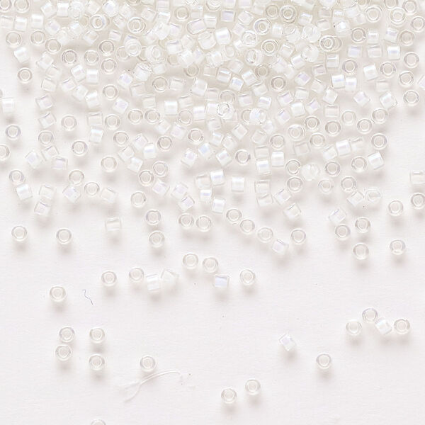 Seed bead, Delica®, glass, pkg/7.5g, #11 round, translucent white-lined rainbow crystal clear (DB-0066). image number 0