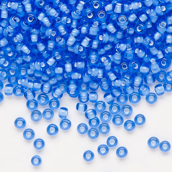 Seed bead, Preciosa Ornela, glass, transparent chalkwhite-lined light sapphire, #8 rocaille. Sold per 50-gram pkg. image number 0