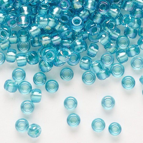 Seed bead, Miyuki, glass, pkg/25g, #6 rocaille, translucent aqua-lined luster crystal clear (RR-1822). image number 0