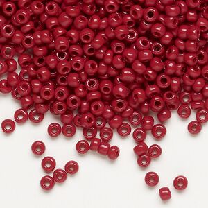 Seed bead, Dyna-Mites™, glass, opaque brick red, #8 round. Sold per 1/2 kilogram pkg.