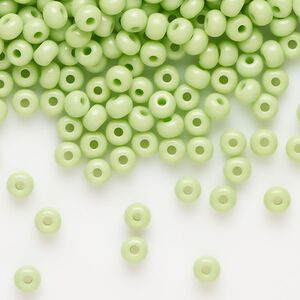Seed bead, Preciosa Ornela, glass, opaque pale green, #6 rocaille. Sold per 50-gram pkg.