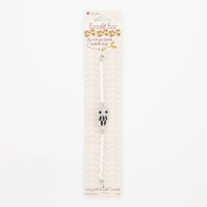 Bracelet, glass / enamel / silver-finished "pewter" (zinc-based alloy), white and black, 18mm wide owl, 6 inches. Sold individually.