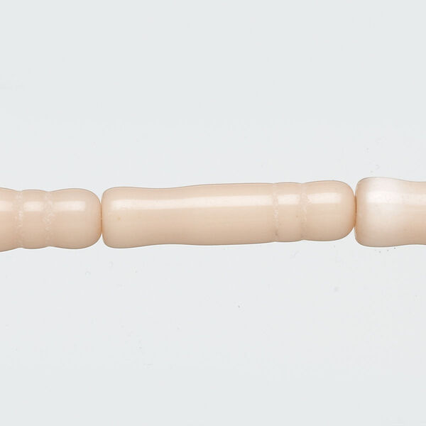 Bead, cat's eye glass (fiber optic glass), light peach, 25x6mm-26x8mm textured round tube. Sold per 15-inch strand. image number 0
