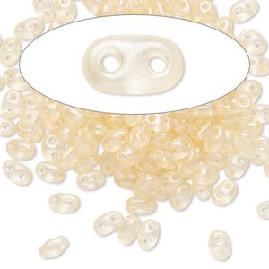Seed bead, Preciosa Twin™ Czech glass, pkg/10g, 5x2.5mm oval, translucent light peach terra pearl clear, (08192).