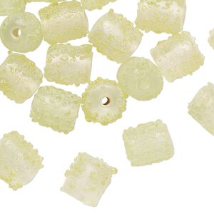 Bead, lampworked glass, translucent clear and yellow-green, 11x9mm textured round tube. Sold per pkg of 40 beads.