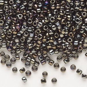 Seed bead, Dyna-Mites™, glass, opaque iris gold, #8 round. Sold per 40-gram pkg.
