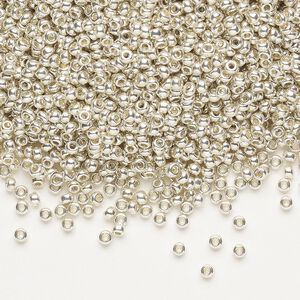 Seed bead, Preciosa Ornela Czech glass, pkg/50g, #11 rocaille, opaque metallic terra dyed silver clear, (18503).