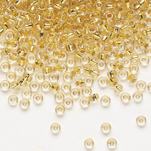 Seed bead, Miyuki, glass, pkg/250g, #8 rocaille, translucent 24Kt gold-lined crystal gold, (RR-195).