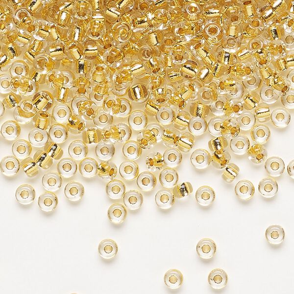 Seed bead, Miyuki, glass, pkg/250g, #8 rocaille, translucent 24Kt gold-lined crystal gold, (RR-195). image number 0