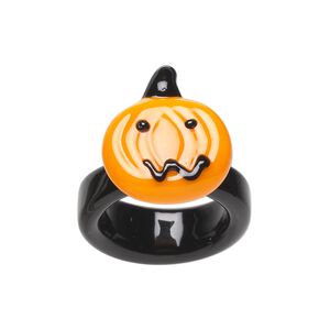 Ring, lampworked glass, black and orange, 20x17mm jack-o-lantern face, size 7.5 to 8. Sold individually.