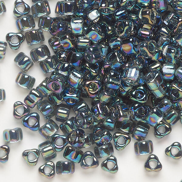 Seed bead, Miyuki, glass, transparent iris grey, (TR1157), #5 triangle. Sold per 250-gram pkg. image number 0