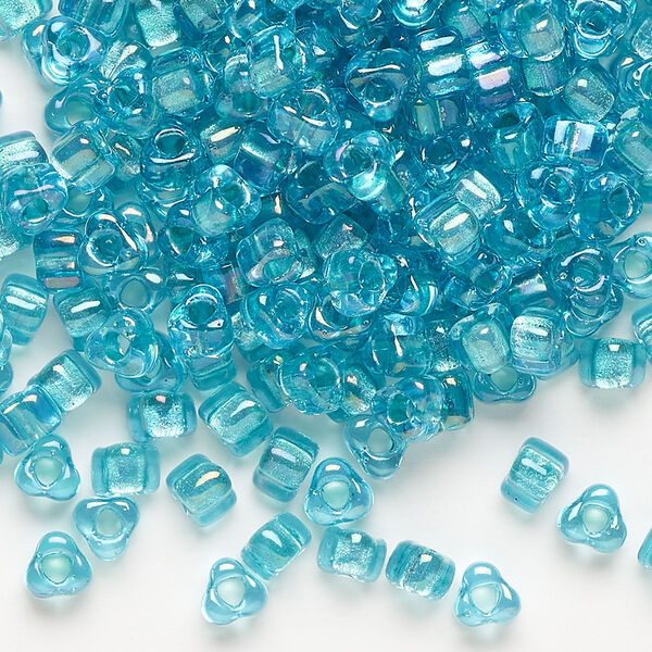Seed bead, Miyuki, glass, transparent light blue color-lined teal, (TR1822), #5 triangle. Sold per 250-gram pkg. image number 0