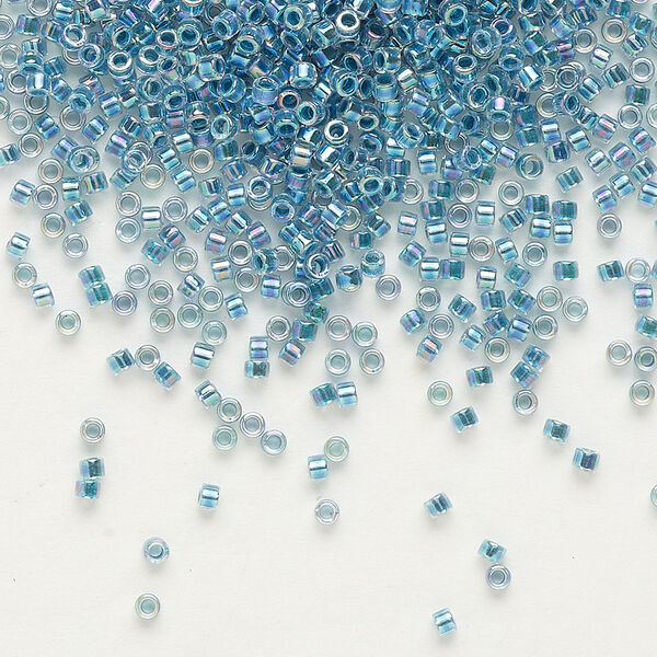 Seed bead, Delica®, glass, pkg/7.5g, #11 round, translucent marine blue-lined rainbow crystal clear (DB-0058). image number 0