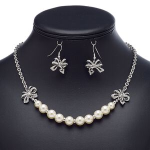 Necklace and earring set, enamel / glass rhinestone / glass pearl / imitation rhodium-finished steel / brass / "pewter" (zinc-based alloy), black / white / clear, bow, 18-inch necklace with 2-inch extender chain and lobster claw clasp, 31mm earrings with fishhook ear wire. Sold per set.