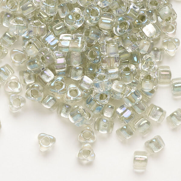 Seed bead, Miyuki, glass, transparent clear color-lined foam green, (TR1135), #5 triangle. Sold per 250-gram pkg. image number 0